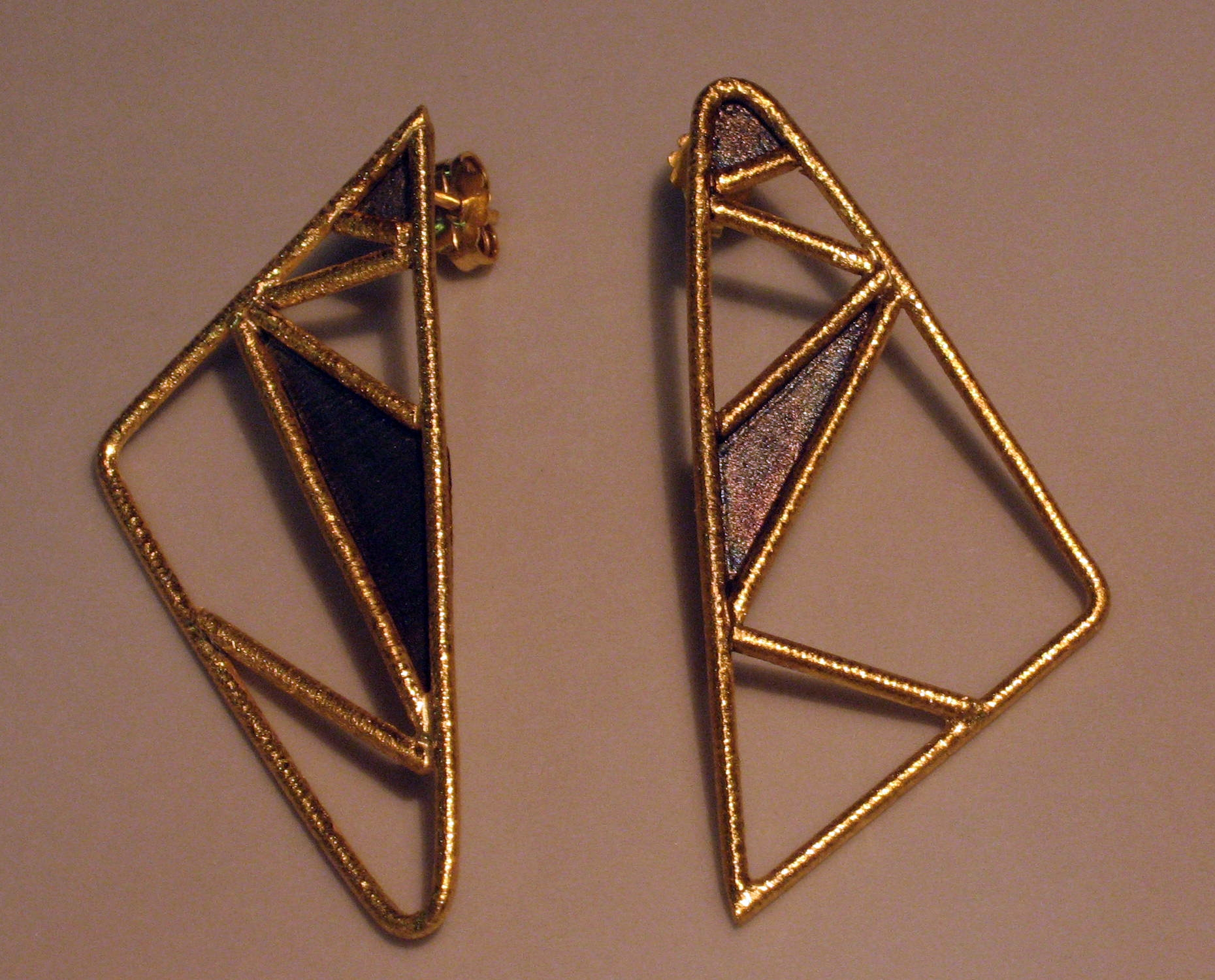 brincos triangulos